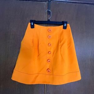60’s style yellow mini skirt
